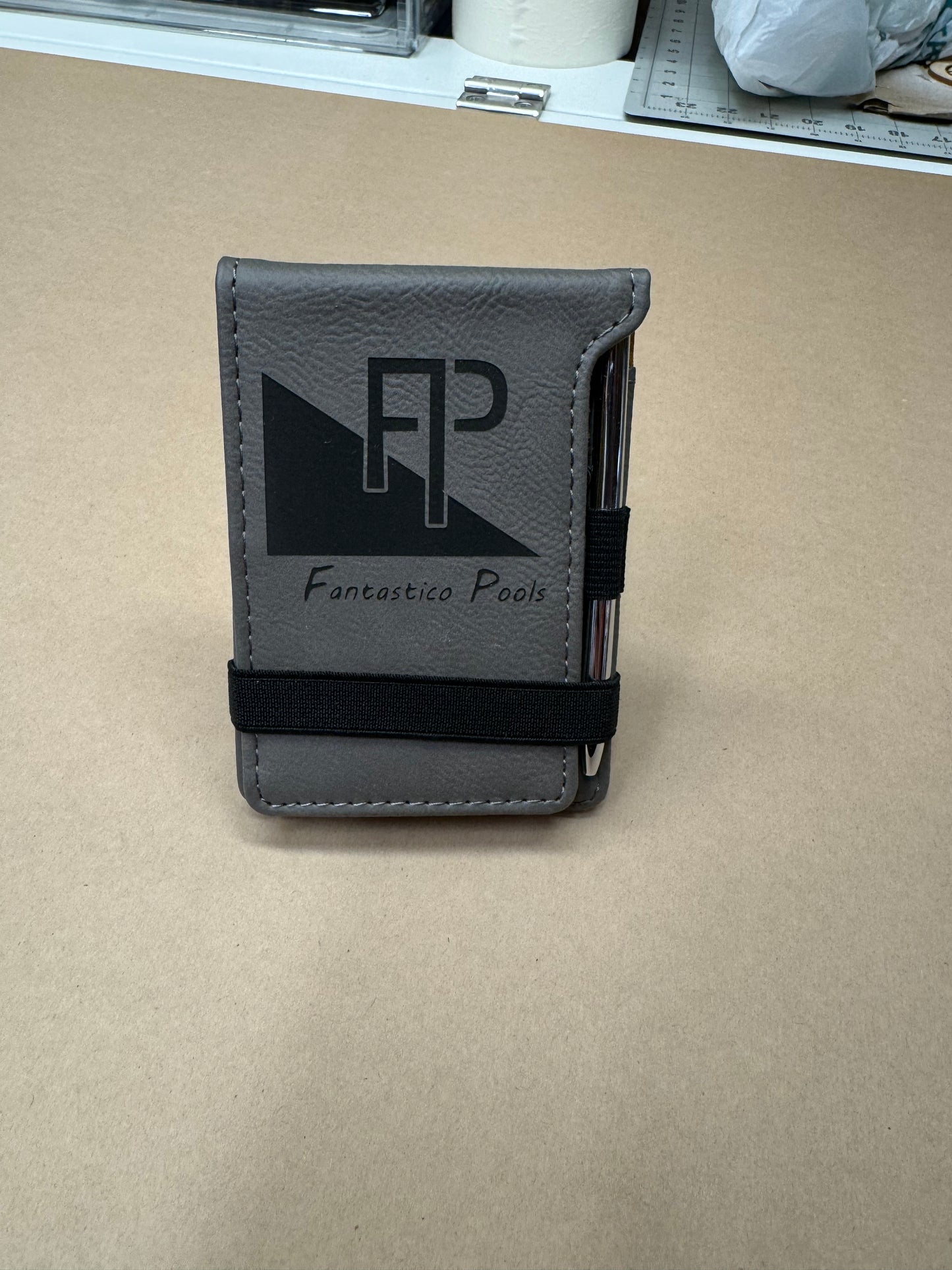 Laser engraved palm sized note pad with pen