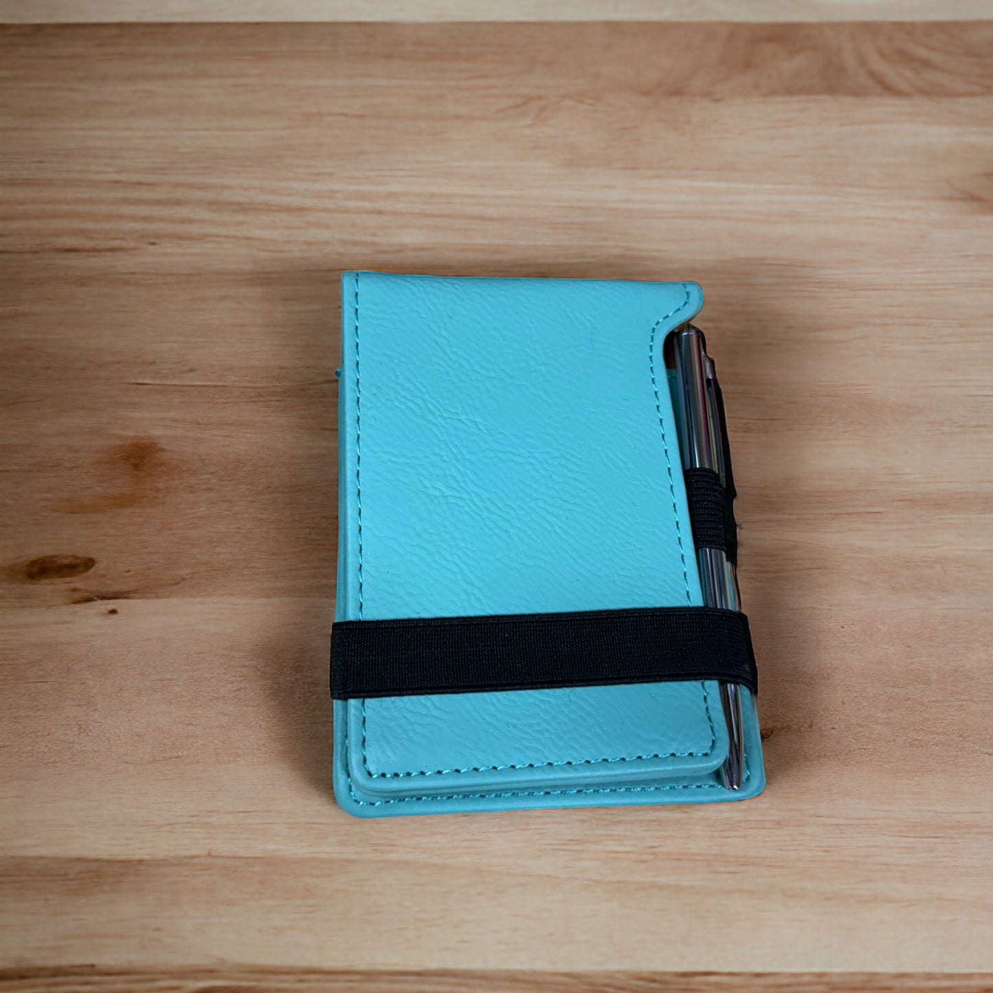 Laser engraved palm sized note pad with pen