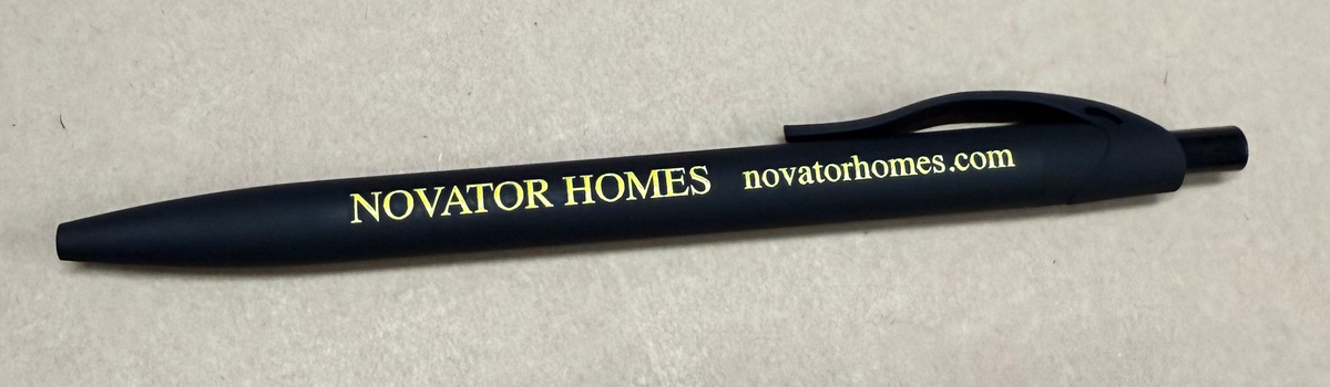 Full black pen with Novator Homes printed branding.